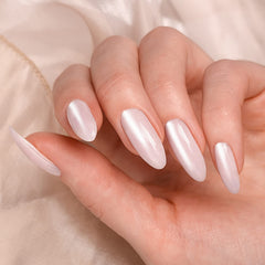 Artdone UV gel nails with mirror finish using chrome powder.