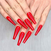 Artquee red ballerina nails with glossy full-cover finish for at-home manicures.