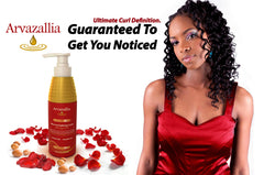 Arvazallia Ultra Curl Cream hands applying for smooth, controlled curl definition.
