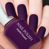ASMAYSA Dark Purple Matte Nail Polish bottle close-up showing rich color and velvety finish.