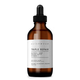 Asterwood Triple Repair Serum bottle closeup, fragrance-free formula for sensitive skin.