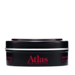 Atlas Pomade being applied to wet hair delivers firm hold.