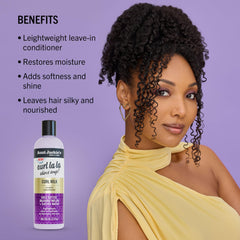 Aunt Jackie's Curl La La Milk in hands ready to soften and detangle strands