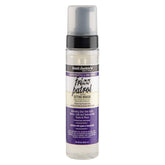 Aunt Jackie's Frizz Patrol bottle pour showing lightweight hold and shine.