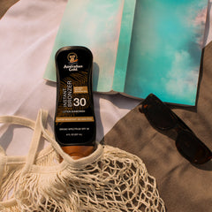Australian Gold Sunscreen Lotion bottle in water-resistant context for pool or beach
