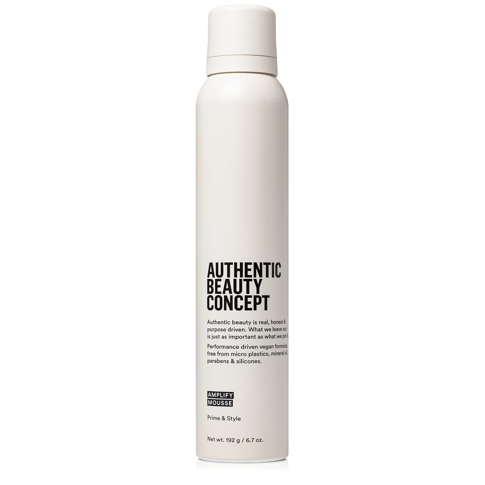 Authentic Beauty Concept Amplify Mousse bottle shows a lightweight volumizing formula for natural body.