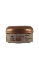 Close-up of Avalon Organics Avlon Keracare Edge Tamer smoothing edges for a silky finish.