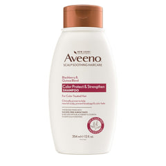 Aveeno color protect shampoo bottle on counter, supports color-treated hair protection.