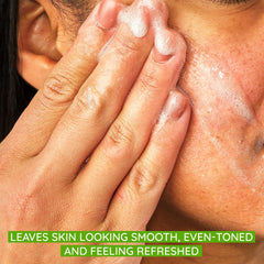 Close-up of Aveeno Positively Radiant scrub with exfoliating granules.