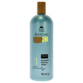Avlon KeraCare dry and itchy scalp shampoo bottle showing anti-dandruff moisture benefits.