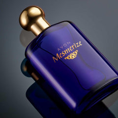 Close-up of AVON Mesmerize Men bottle cap highlighting premium design.