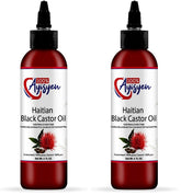 100% AYISYEN Haitian Black Castor Oil bottle ready for hair care routine