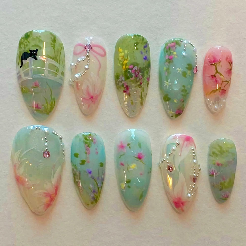 BABALAL almond press-on nails in blue-green with bow for stylish occasions