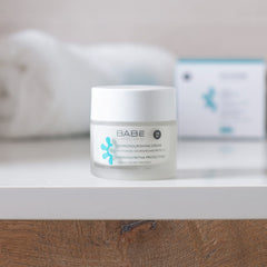 Babe Hydronurishing Cream texture swirl illustrates rich hydration for smoother skin.