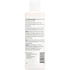 Close-up of Badger DHS Conditioning Rinse label highlighting fragrance-free formula with panthenol