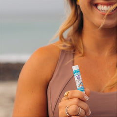 Badger reef-safe lip balm protects lips while supporting coral-friendly sun care