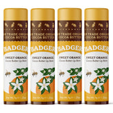 Badger Sweet Orange Cocoa Butter Lip Balm closeup shows creamy, hydrating texture