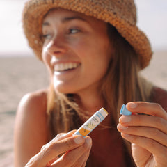 Badger lip balm packaging highlighting organic care and simple ingredients