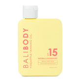 Bali Body Pineapple Tanning Oil bottle highlights SPF15 protection and a sun-kissed glow