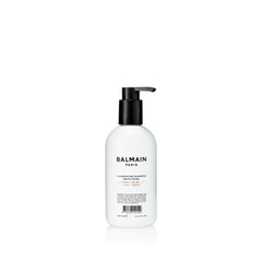 Balmain Hair Illuminating Shampoo White Pearl bottle, enhancing blonde color and reducing brassiness.