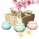 Banami solid perfume trio in ceramic bottle with lotus design, premium storage and scent on skin.