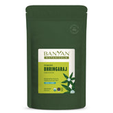 Banyan Botanicals Bhringaraj powder bottle for nourishing hair care routine
