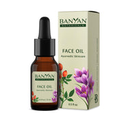 Banyan Botanicals Face Oil bottle close-up with rosehip and jojoba for radiant skin.