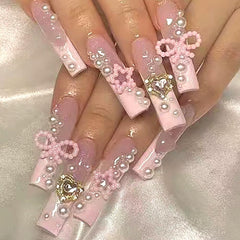 Baoyaalin cute press-on nails in pink long square with 3D rhinestones for wedding glam.