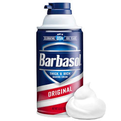 Close-up of Barbasol Original foam forming a rich lather for easy razor glide.