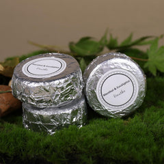 Bare Shower Bombs fizzing steam in a warm shower for relaxation