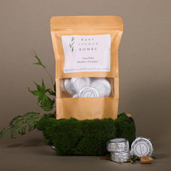 Bare Shower Bombs unwrapped on shelf ready to fizz and release aroma