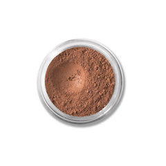 BareMinerals loose powder concealer SPF 20 Deep Bisque, jar close-up for lightweight concealment.