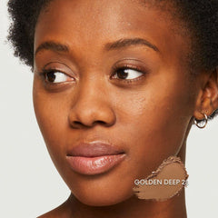 bareminerals loose powder being swirled for buildable coverage on skin