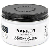 Barker Wellness Tattoo Butter bottle closeup showing a nourishing, non-greasy finish for your ink