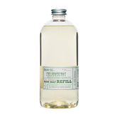 BARR-CO hand soap refill bottle pour demonstrates easy refill with a clean sink setup.