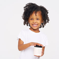 BASK & LATHER slippery elm eases detangling and controls frizz on curls
