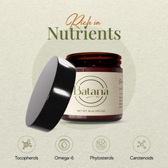 Batana Oil is poured onto fingertip for scalp nourishment.