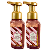 Bath and Body Works Crushed Candy Cane foaming hand soap bottles with seasonal design for festive home care
