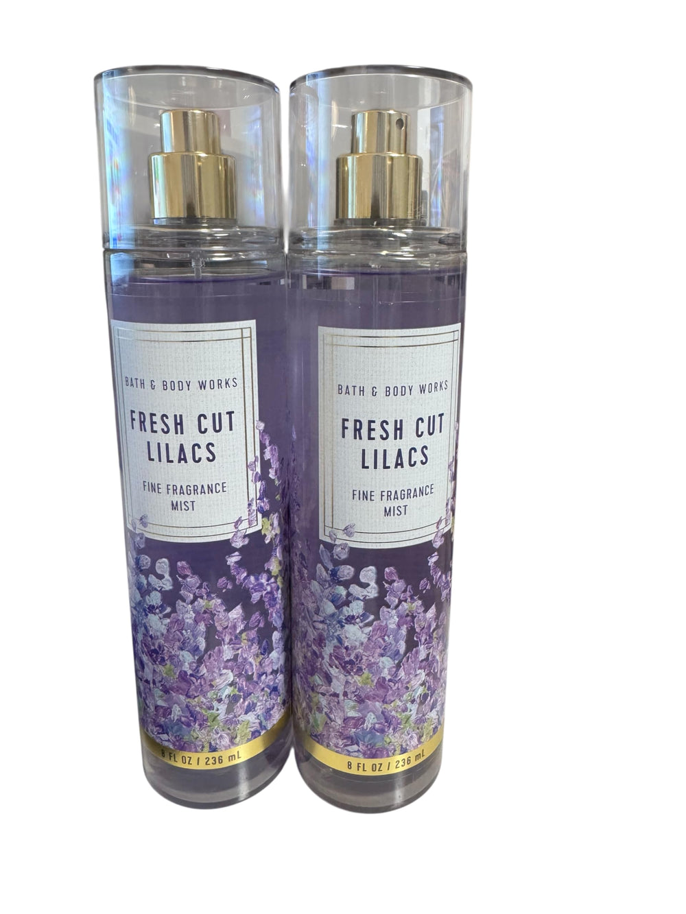 Bath & Body Works Fresh Cut Lilacs mist bottle 1, crisp floral scent for daily freshness.