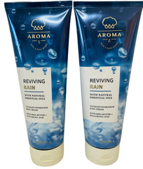 Bath & Body Works Reviving Rain body cream bottle visible, offering lasting hydration and a refreshing scent.