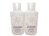 Bath & Body Works Snowflakes & Cashmere two 8oz lotion bottles offering lasting moisture.