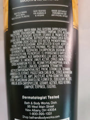 Bath & Body Works Whiskey Reserve body wash pour emphasizing Pro-Vitamin B5 and Aloe for hydration.