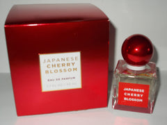 Bottle and box on a dresser, timeless signature Bath & Body Works Japanese Cherry Blossom EDP.