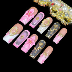 BByogooz nails with gold frames and pearl motifs close-up