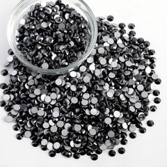 Beadsland rhinestones being applied with glue for easy DIY decoration.