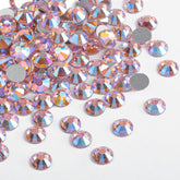 Beadsland rhinestones bottle close-up with light pink AB sparkle for nail art.