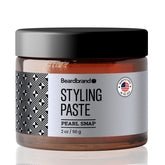 Beardbrand beard styling paste in teakwood jar with natural look and medium hold.