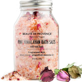 Beaute De Provence pink Himalayan bath salts with rose petals in a bottle for relaxation.