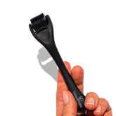 Beautimate microneedle derma roller on the face for gentle skin care.