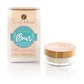 Beauty Bakerie Flour Setting Powder in translucent jar for weightless even finish.